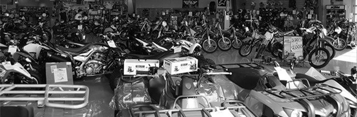 Black and white banner image of Experience Powersports' Showroom Floor